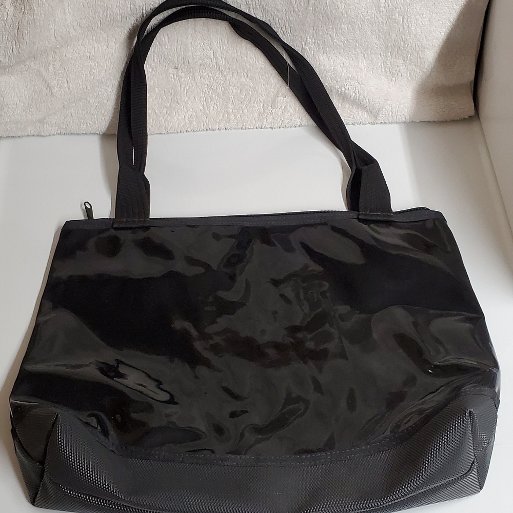 Tutela Handbag